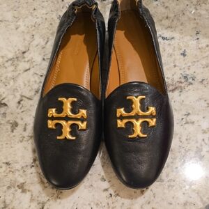 Tory Burch Black Flats with Gold Emblem
